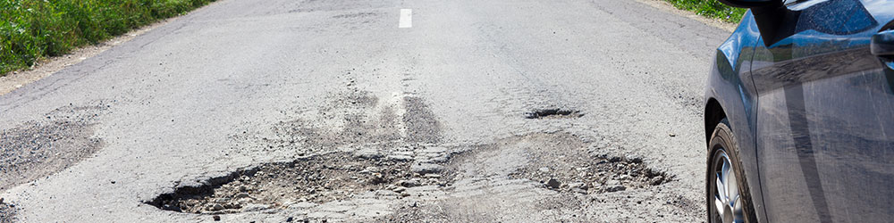 How to Know if There’s Damage to Your Vehicle After Hitting a Pothole, Youngs Insurance, Ontario