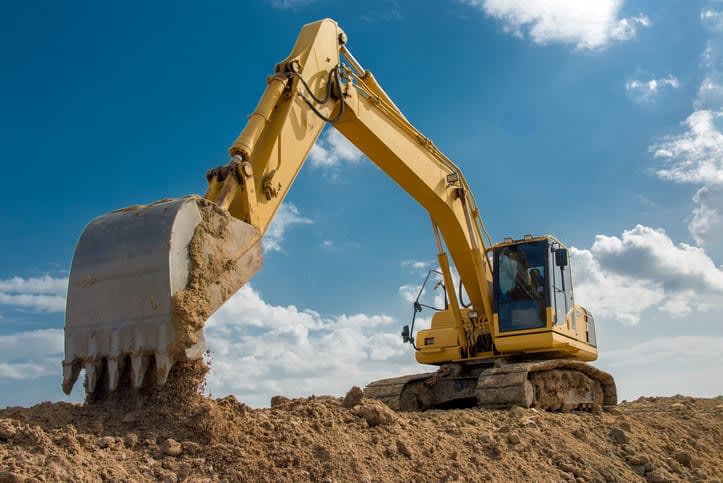 excavator insured by contractors and trade insurance