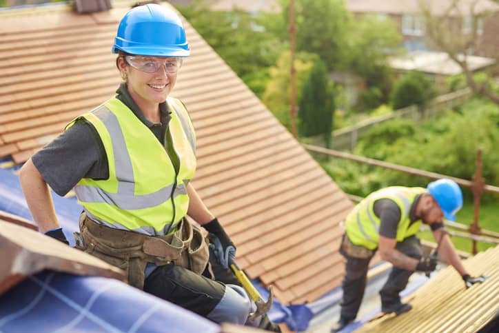 roofers and contractors happy and safe smiling because they are protected by contractors insurance